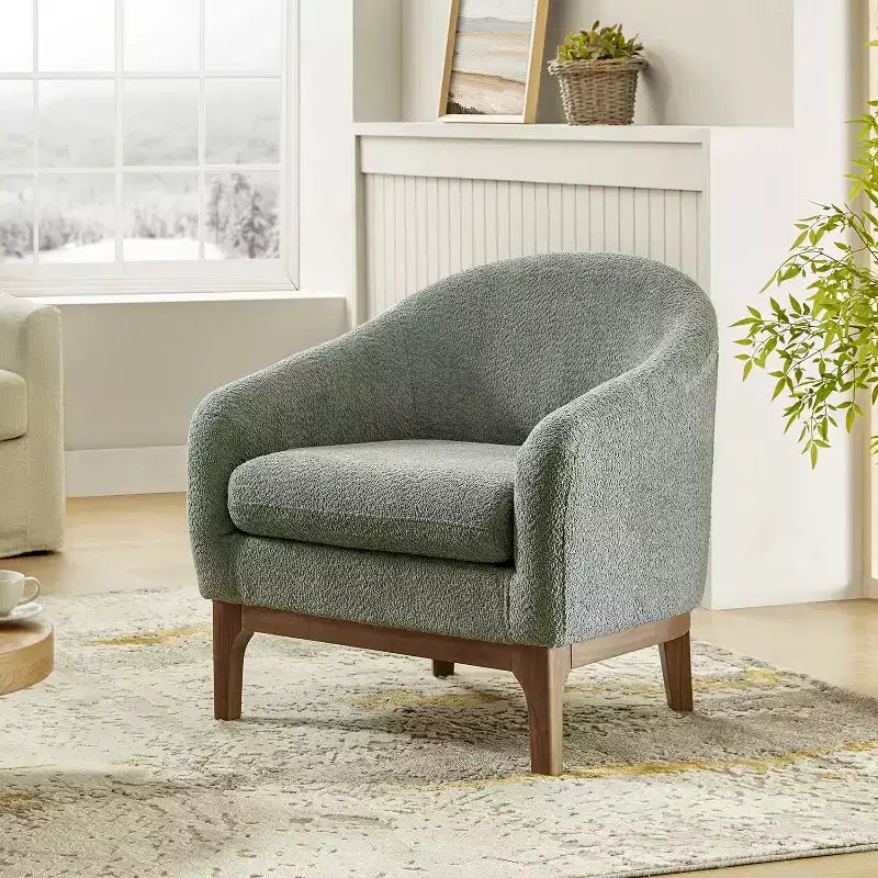 Poltrona Kiian Boucle con gambe in legno massello | HULALA HOME