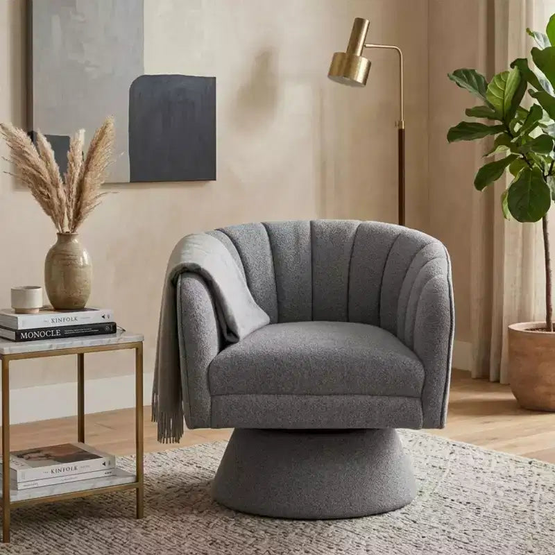 Poltrona girevole moderna GDFStudio Madison in boucle con schienale a botte